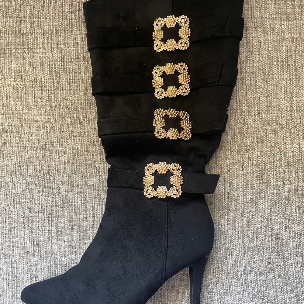 Elegant Black Knee-High Boots with Gold Accents